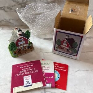 The Pottery Shop Red Ceramic Figurine Liberty Falls